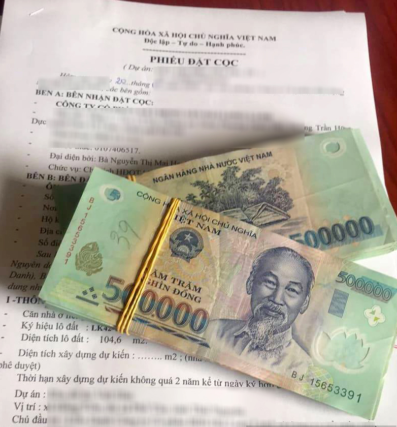 Đặt cọc là bước không thể thiếu khi mua đất