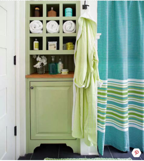 phòng tắm nhỏ màu xanh