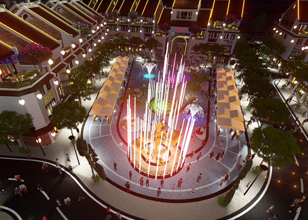 Quảng trường nước ở giữa các dãy nhà cao tầng với đèn sáng có nhiều người đang vui chơi