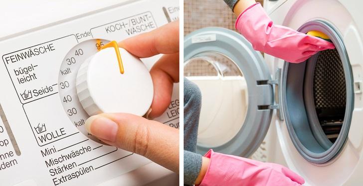 hình ảnh bàn tay đang vặn núm máy giặt, vệ sinh máy giặt