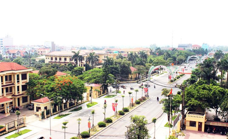 nhiều công trình nhà ở, cây xanh trong thành phố