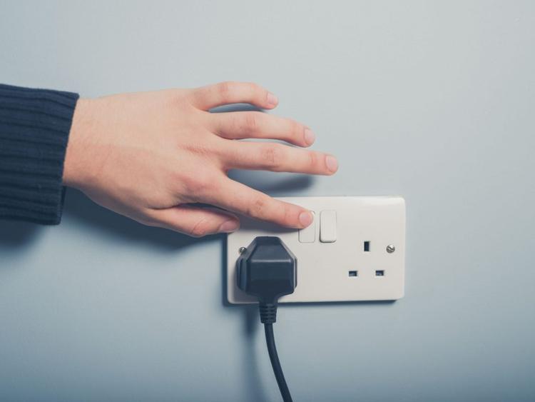 Male hand pushing switch
