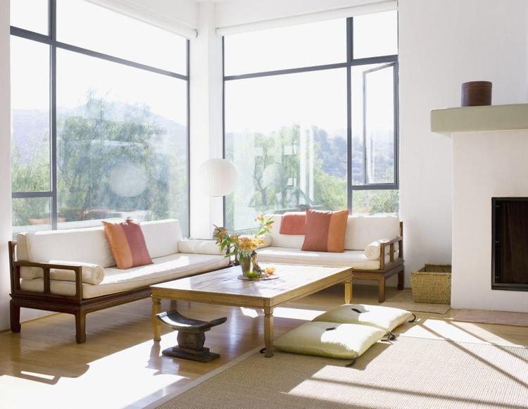 living-room-interior-with-large-window-sofa-coffee-table-and-natural-light