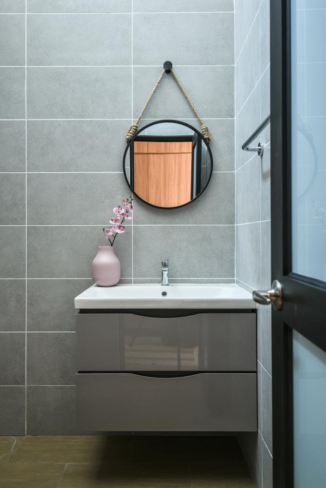 Floating vanity with a hanging mirror