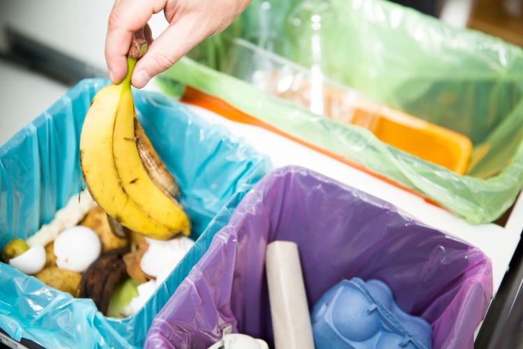throwing banana skin into the bin