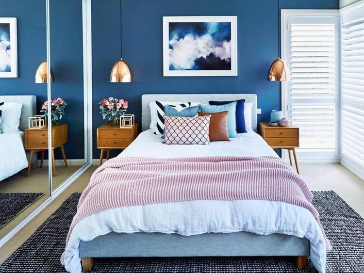 Use rugs to zone your bedroom space