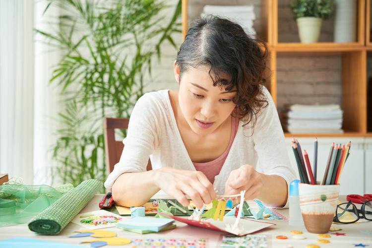 woman working on craft
