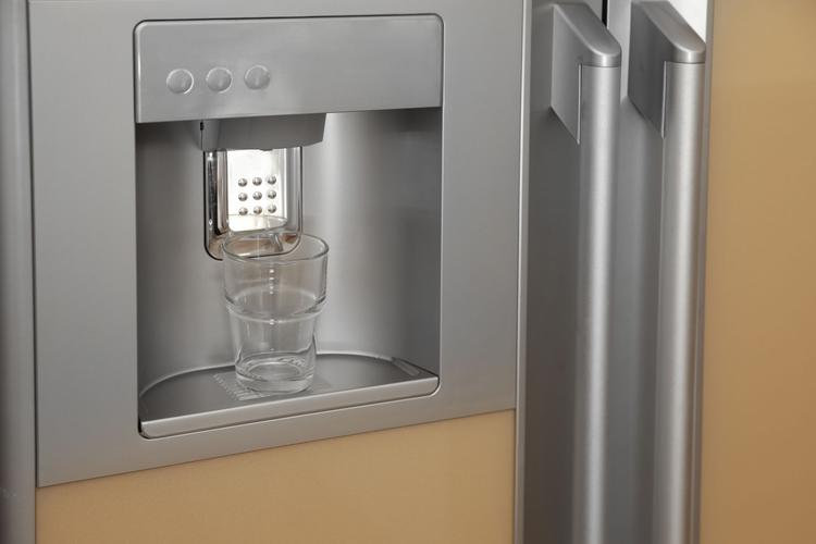 Refrigerator with ice and water dispenser