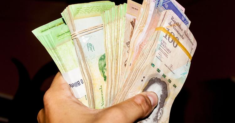 https://www.123rf.com/photo_61148182_stack-of-venezuelan-currency-bolivar-fuerte-is-hold-in-the-hand-due-to-hyperinflation-it-is-necessar.html?term=hyperinflation&vti=mfa2be6h2j4ahf1xut-3-58