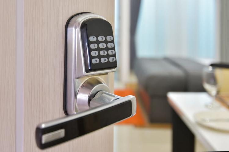 What advantages does an electronic locking system have over a metal key locking system?