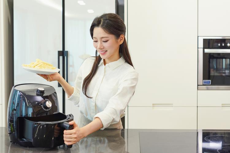 Can I pause the cooking process in the air fryer and resume later?