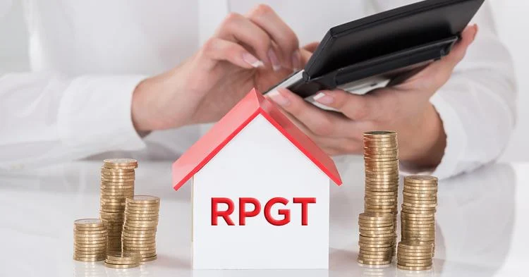 A small house model with a red roof labelled RPGT