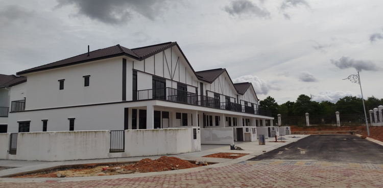 Row of newly constructed white and black modern terrace houses.