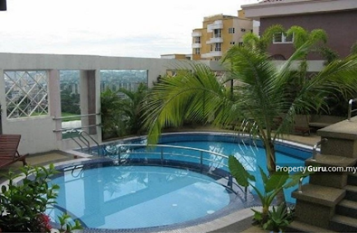 Rooftop wading pool and jacuzzi area with palm trees