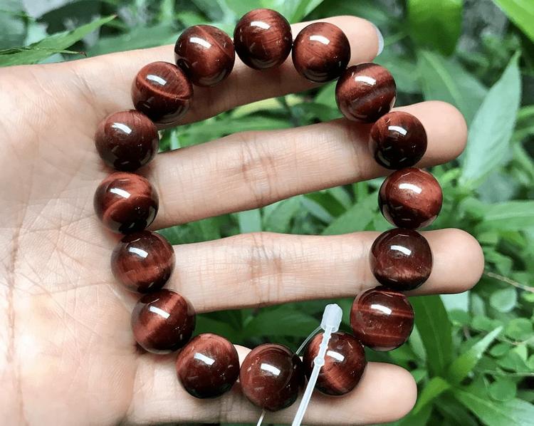 Vòng đá phong thủy mệnh Thổ dành cho nam nữ bằng đá mắt hổ nâu đỏ