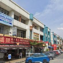 Facing Main Place Road