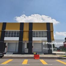 Corner lot facing the main road, located in a busy commercial center.