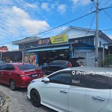 Single storey bungalow facing market