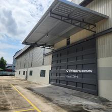Detached factory fronting main road