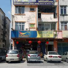 Flat above shops