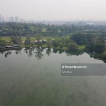 A high-rise condominium facing a lake, offering a magnificent view 