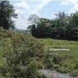 A plot of development land zone for industrial use along the main road
