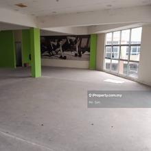 The first floor of a double storey corner shop office front main road