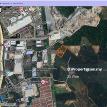 Industrial zoned land currently used for palm oil.  