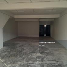 A intermediate double storey shop office fronting main road