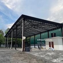 Spacious industrial land with open factory building sale