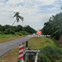 Main road land to let