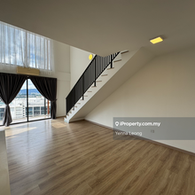 Partially furnished corner unit duplex for sale.
