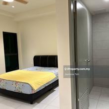 Sinaran Residence Studio unit queen bed