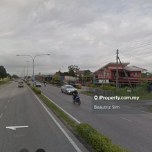 Prime Roadside Land with Vast Potential