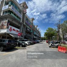 Ground floor shops facing main road 