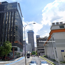 Facing the main road and intersection traffic light