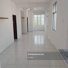 A first floor town house end unit