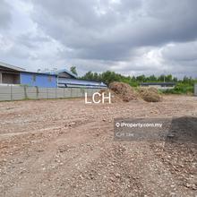 Industrial land with fencing for rent.