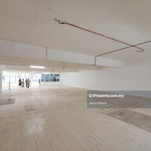 Bare unit & nearby multilevel parking