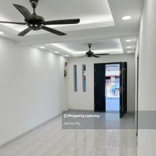 Newly renovated unit with kitchen cabinet and security door.