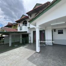 Newly painted house facing empty view