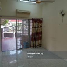 A single storey terrace house located in a low density development