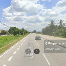 Land under residential and industrial zoning beside main road for sale