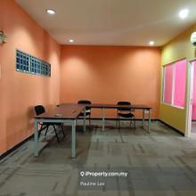 An office unit equipped with office furniture.8