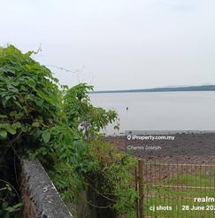 Seaview over neigbour's fence.