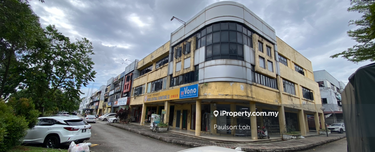 Facing main road, near Econsave Mall 1