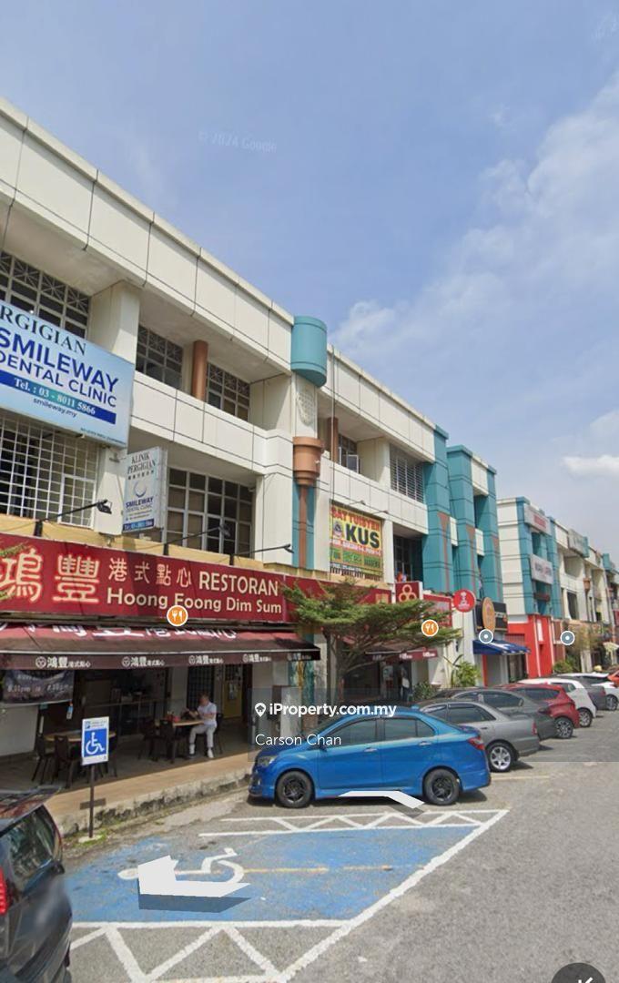 Facing Main Place Road