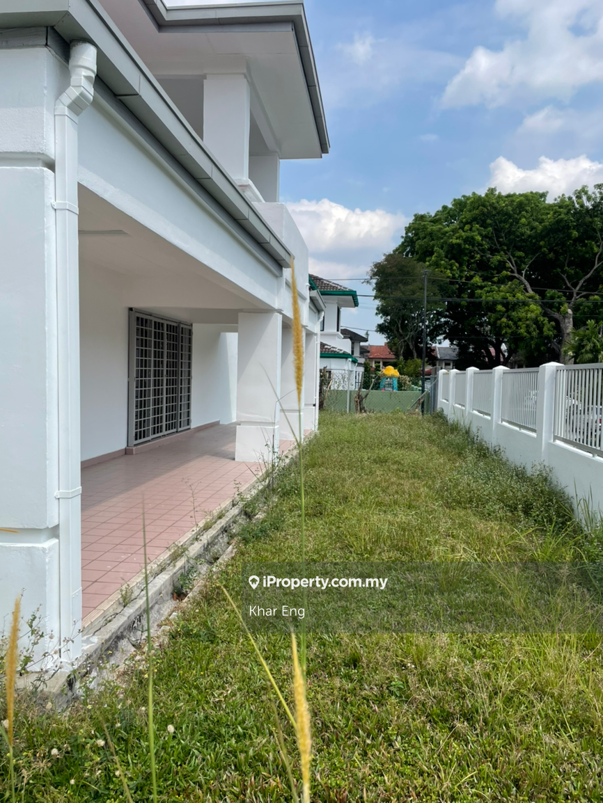 Corner house with land