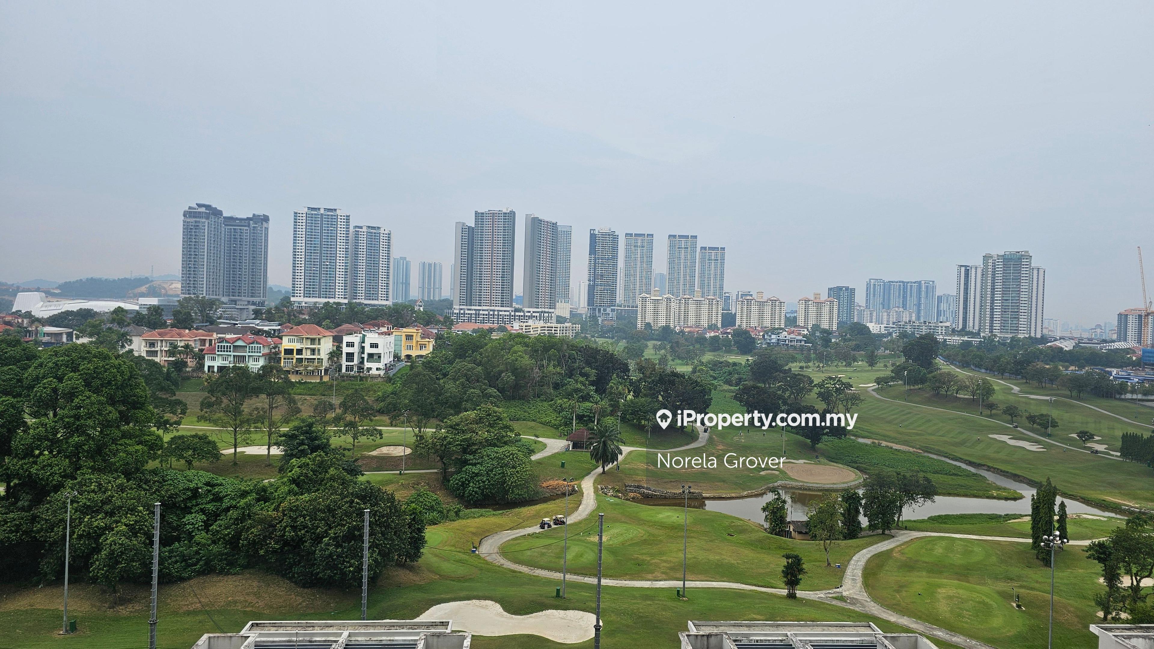 Private corner condo with golf views and two parking spaces