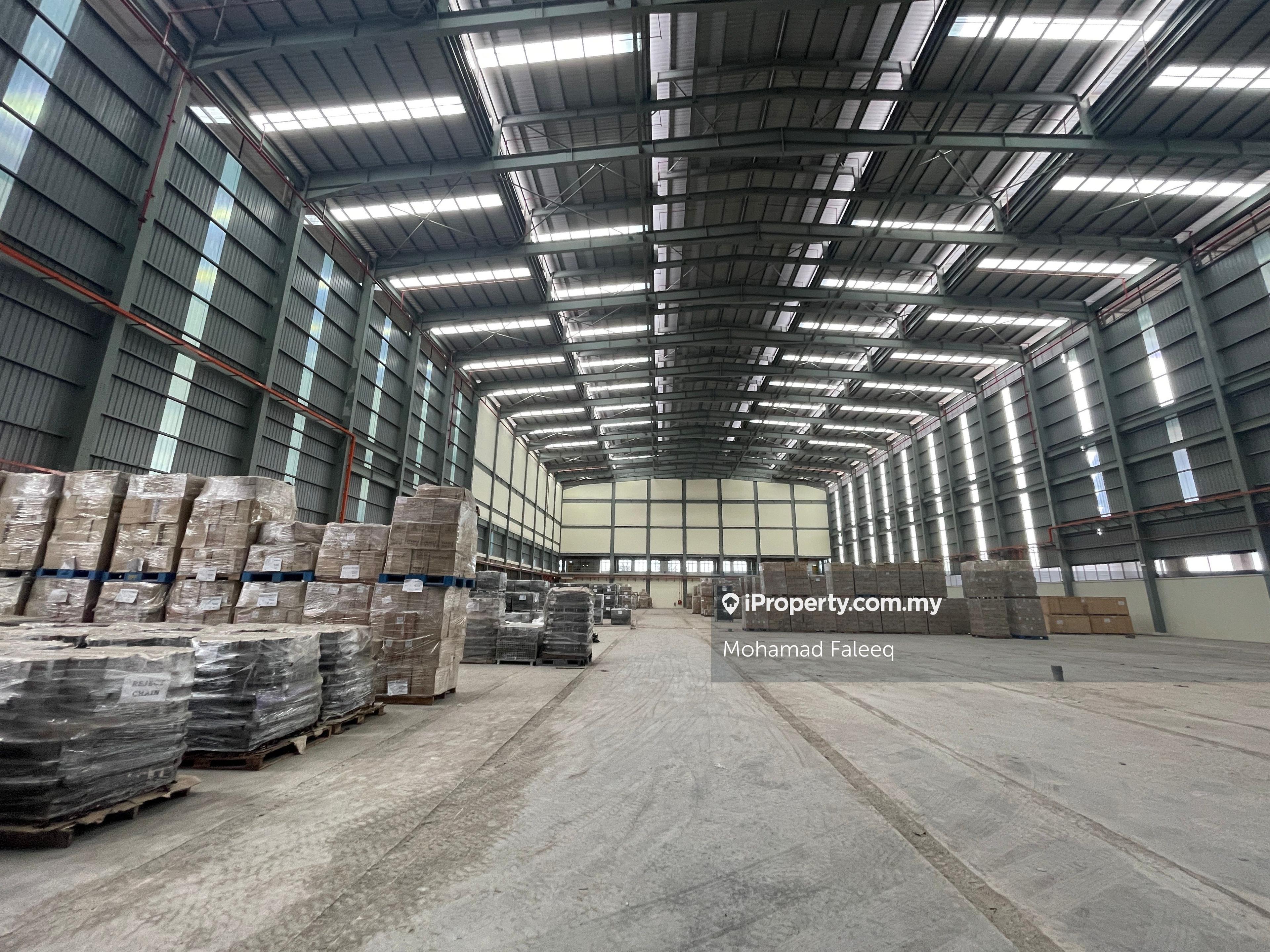 Big factory with high ceiling area, multiple storeys with low ceiling